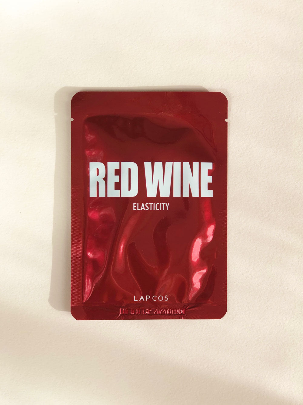 Red Wine sheet mask to brighten, smooth and hydrate skin. By Lapcos
