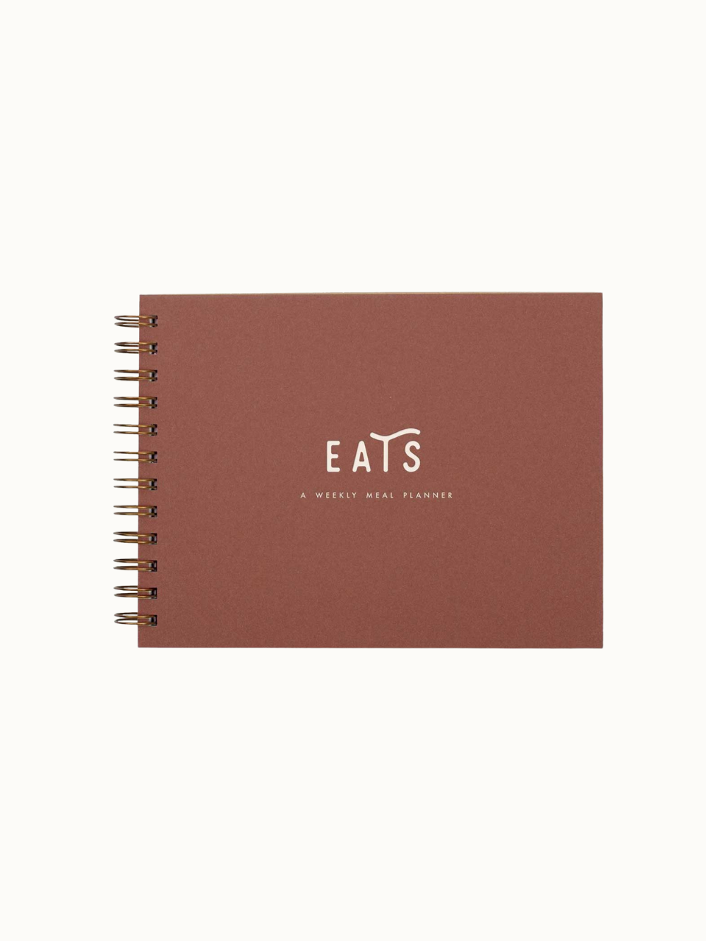 Eats - A simple meal planner. 60 meal planning pages. Terracotta cover with off white ink and a gold wire binding. 