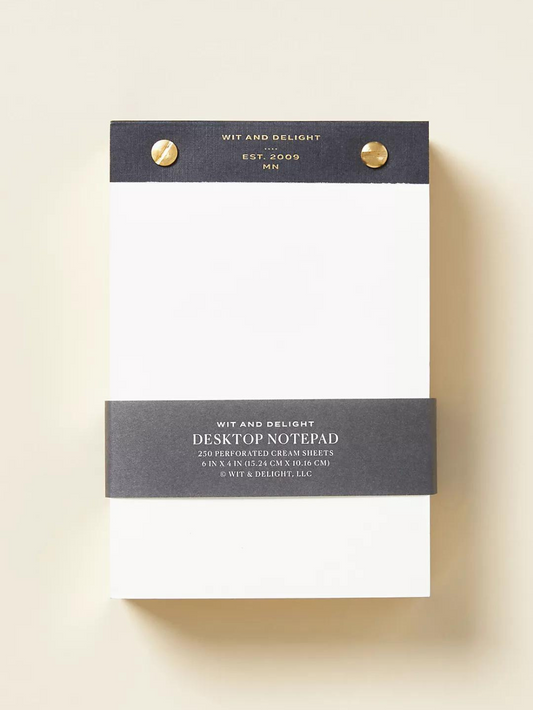 A sleek black and white notepad by Wit and delight. 250 pages.  